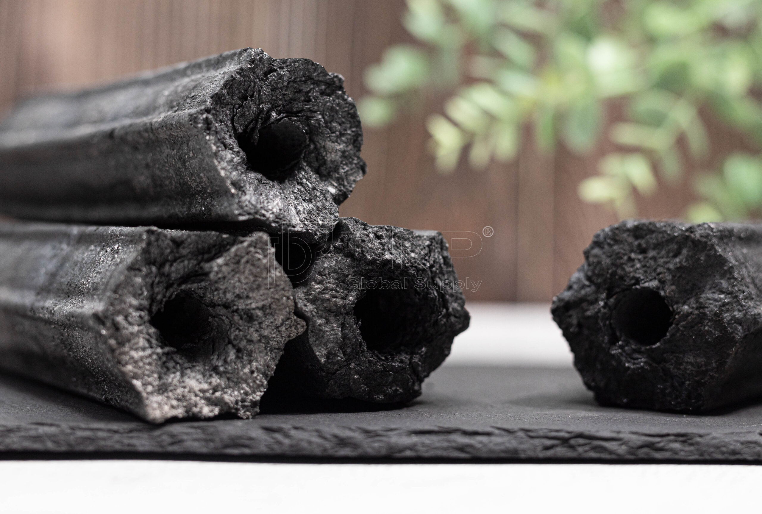Shaping charcoal briquettes