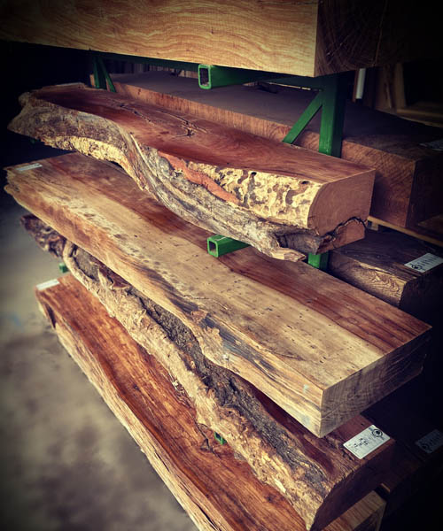 Sawing exotic wood logs